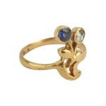 Zlatý secesní prsten s diamantem a safírem