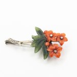 Zlatá brož s broušeným korálem, nefritem a diamanty